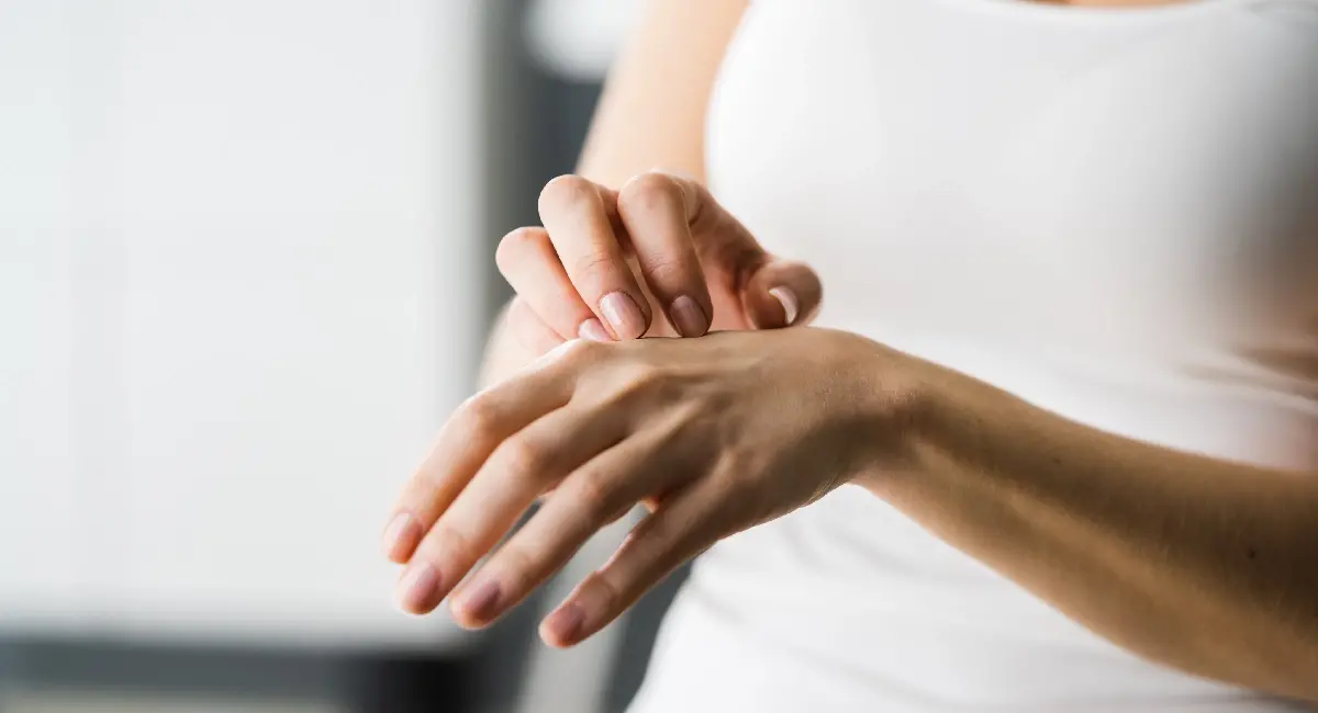 A close-up of a person's hand</p><p></p><p>Description automatically generated with medium confidence
