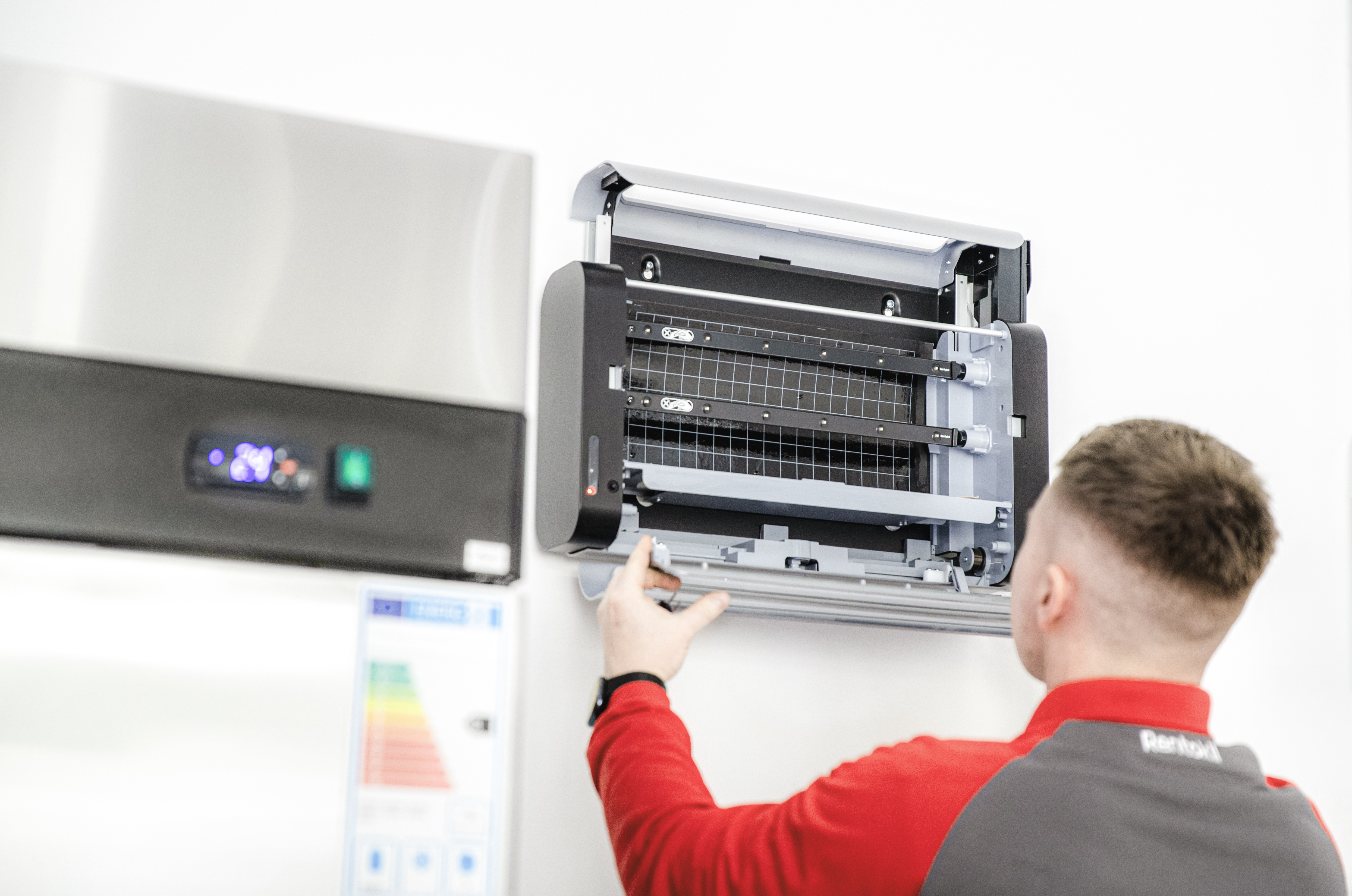 Rentokil Technician installing Lumnia