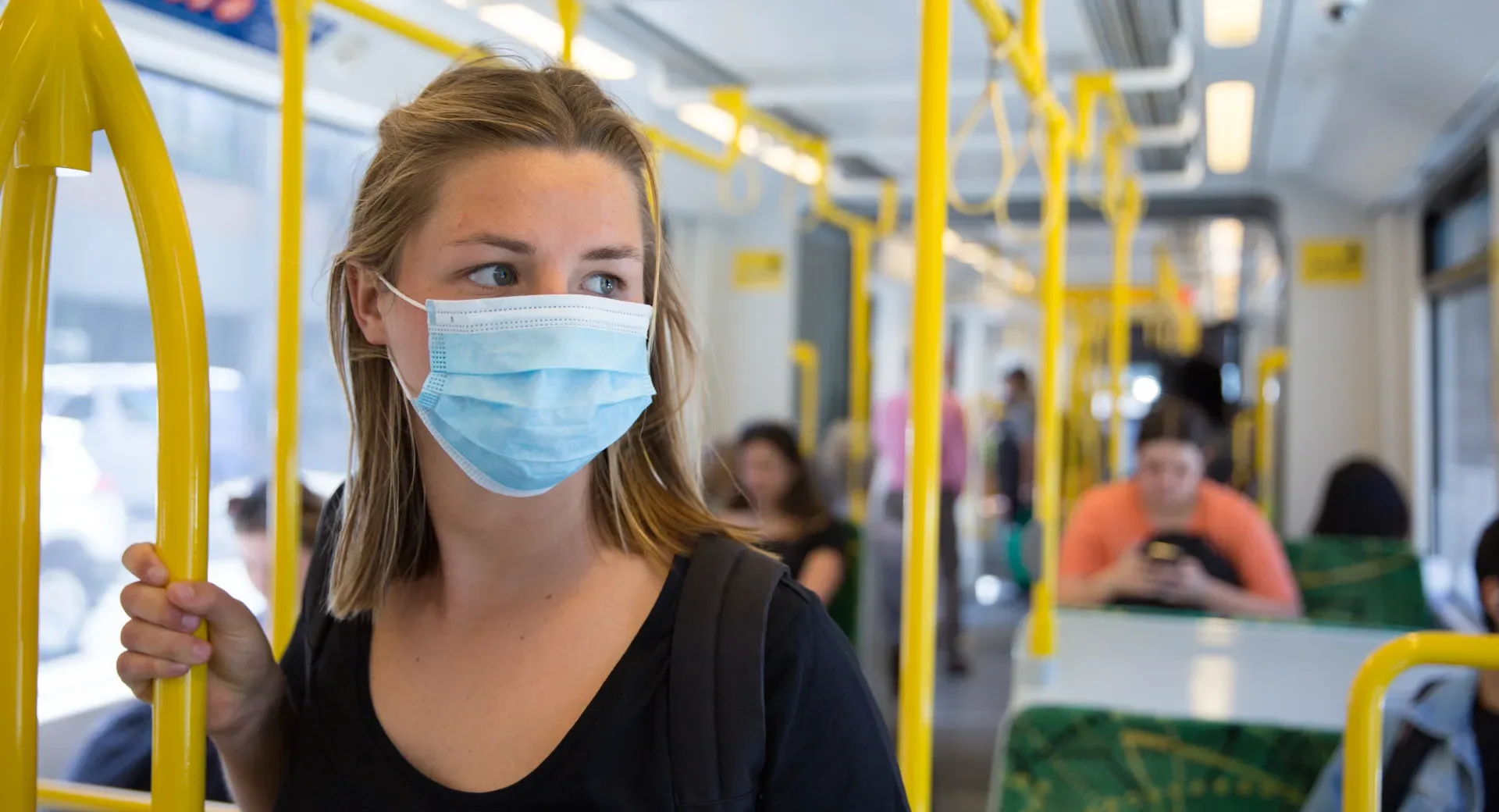 Woman on public transport with mask